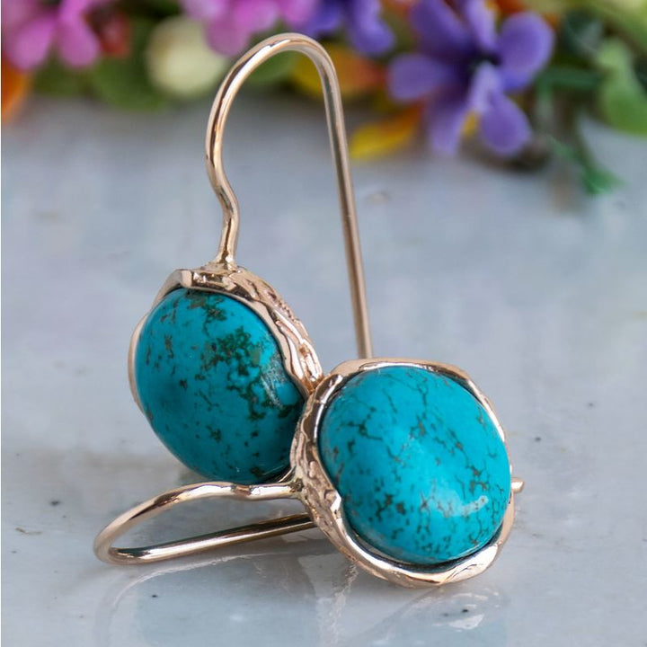 עגילי זהב אדום 14 קראט מעוטרים אבן טורקיז