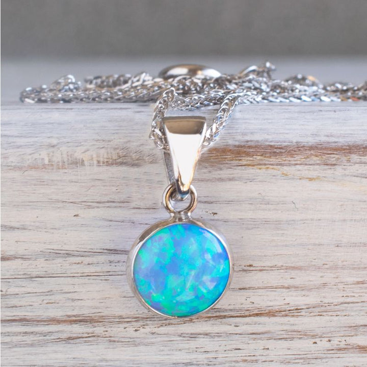 תליון אופל כחול עם זהב לבן