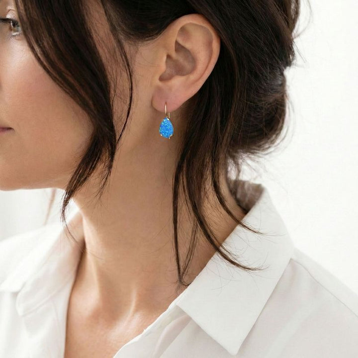 עגילי זהב 14 קראט טיפה אבן אופל כחול