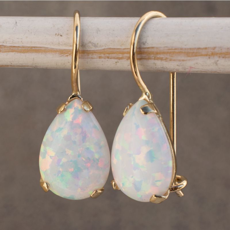 עגילי זהב תלויים בשיבוץ אופל לבן