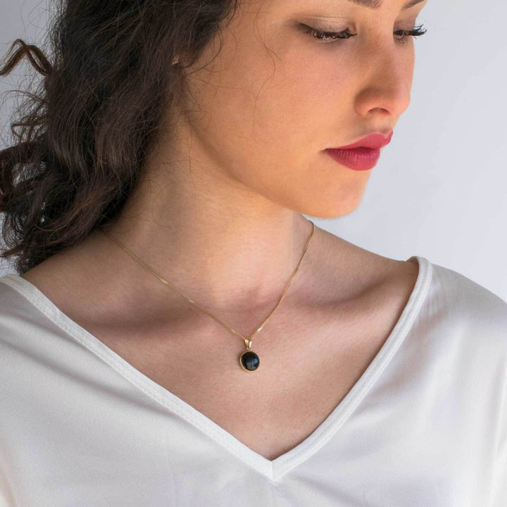 תליון עגול זהב 14 קראט באבן אוניקס