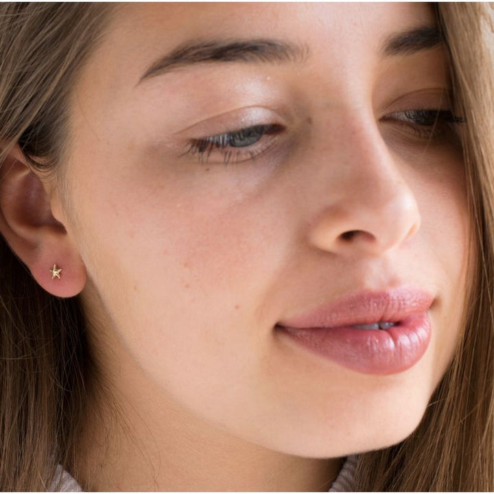 עגילי זהב 14 קראט צמודים כוכב ים