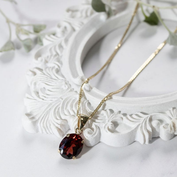 14K Yellow Gold 8x10mm Garnet Oval Pendant