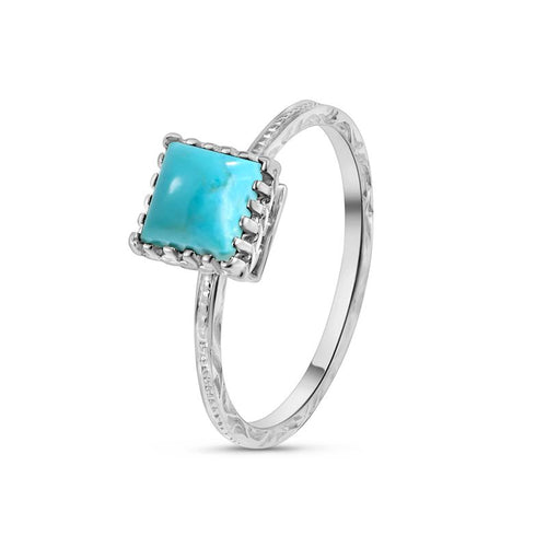 Серебряное кольцо 925 пробы с квадратным бирюзовым камнем.