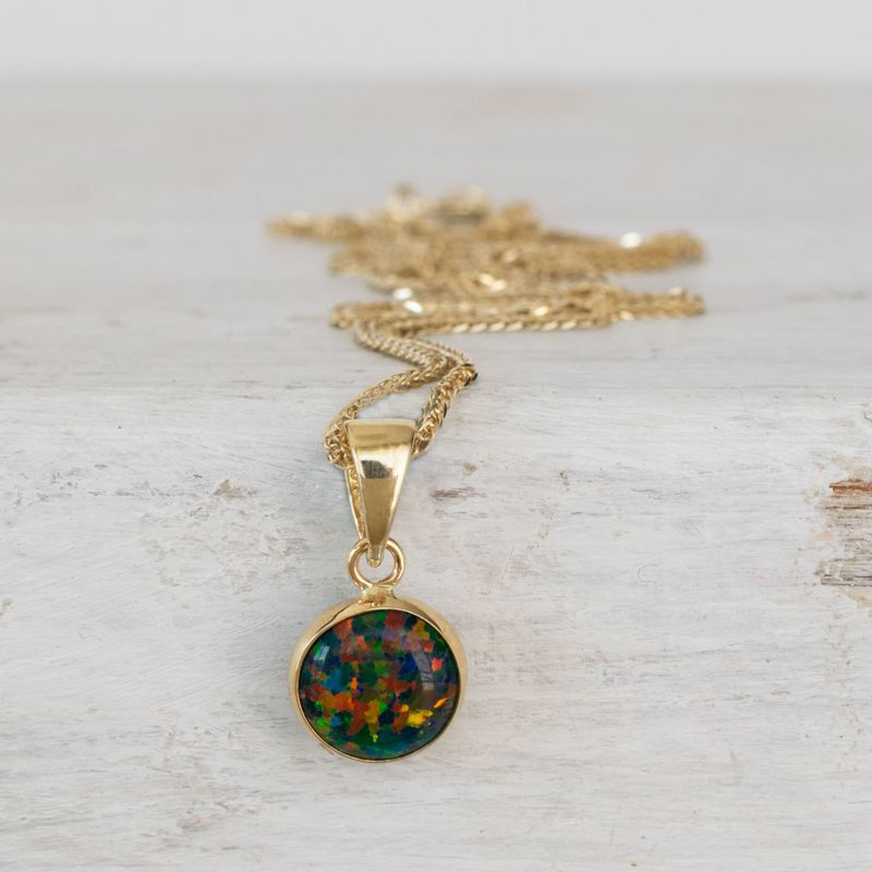 תליון זהב צהוב אופל שחור עגול