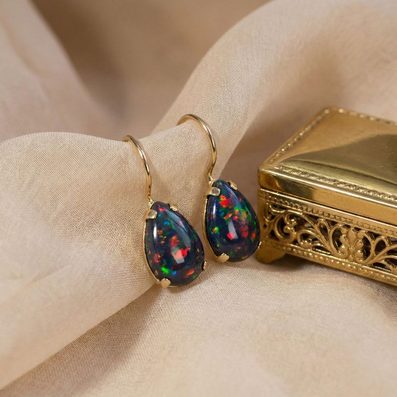 עגילי זהב 14 קראט טיפה אופל שחור