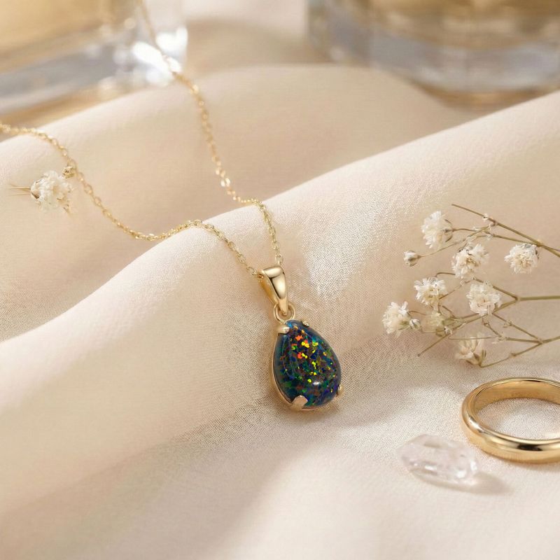 תליון זהב 14 קראט באופל שחור טיפה