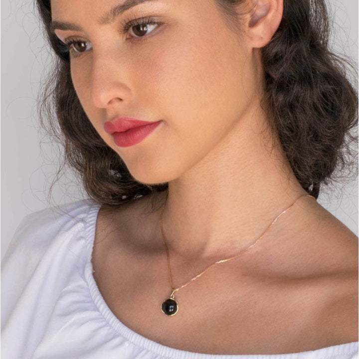 תליון מעוטר במסגרת זהב אדום 14 קראט ואבן גארנט