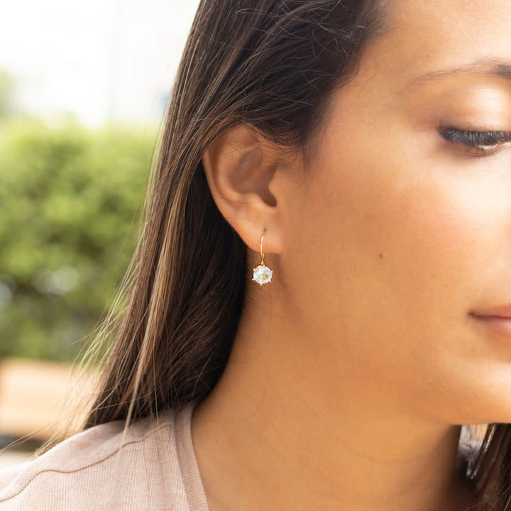 עגילים תלויים ציפוי זהב אבן טופז כחול