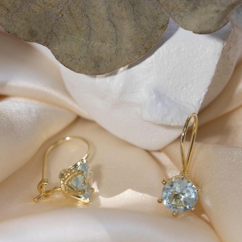 עגילים תלויים ציפוי זהב אבן טופז כחול