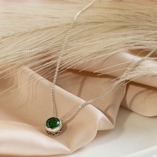 Серебряный кулон с голубым цирконием