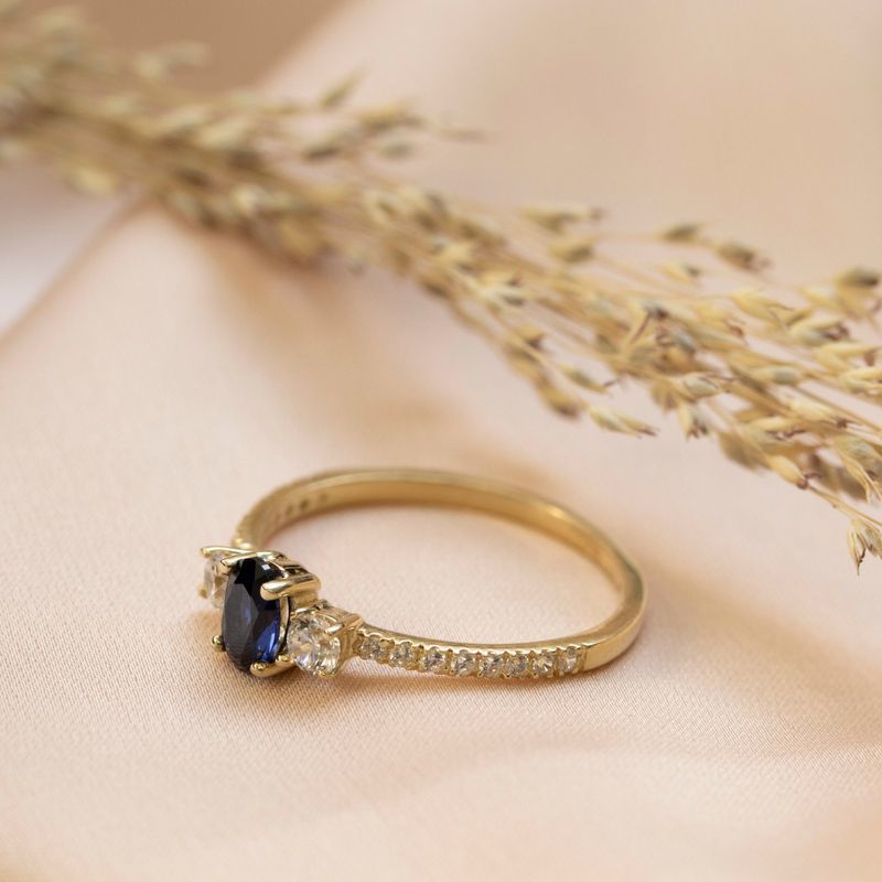 טבעת זהב 14K זרקון כחול