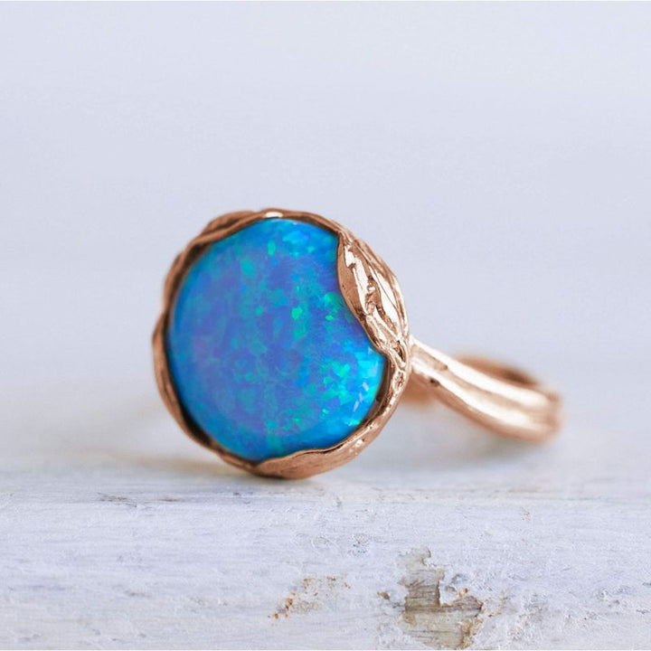 טבעת מתכווננת ציפוי זהב אדום אופל כחול