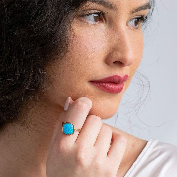 טבעת מתכווננת ציפוי זהב אדום אופל כחול