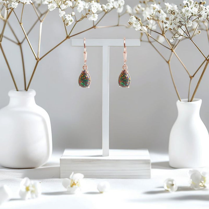 עגילי טיפה בציפוי זהב אדום עם אופל שחור