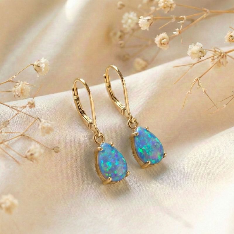 Позолоченные серьги-подвески для барбекю с вставкой из голубого опала.