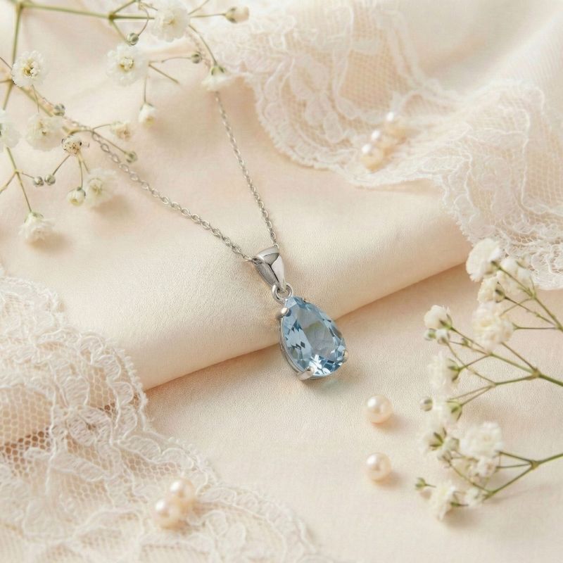 תליון טיפה זהב לבן 14 קראט טופז