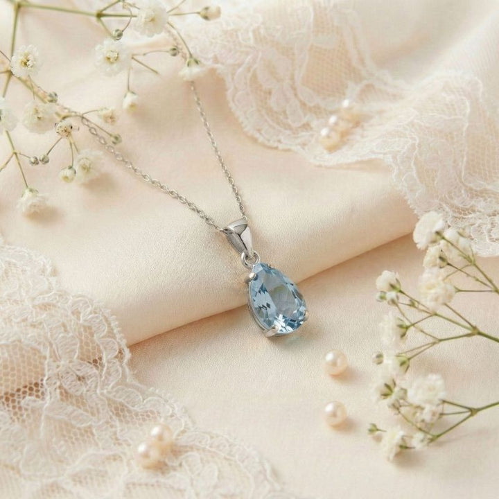 תליון טיפה זהב לבן 14 קראט טופז