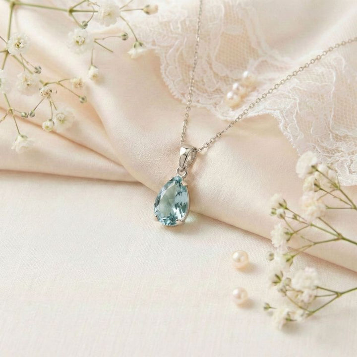 תליון טיפה זהב לבן 14 קראט אקווה מרין מלאכותי