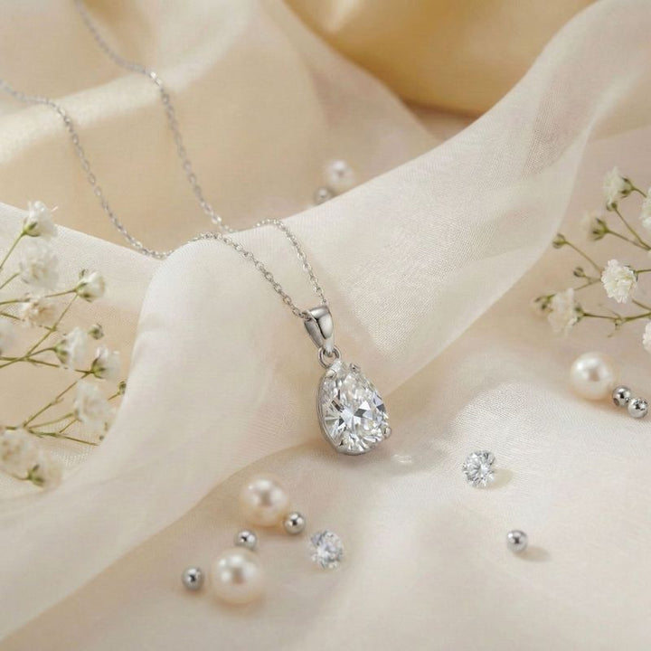 תליון טיפה זהב לבן 14 קראט זרקון לבן