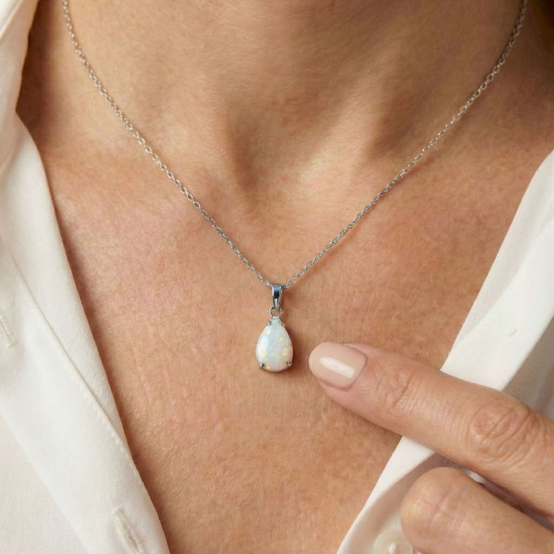 תליון טיפה זהב לבן 14 קראט אופל לבן