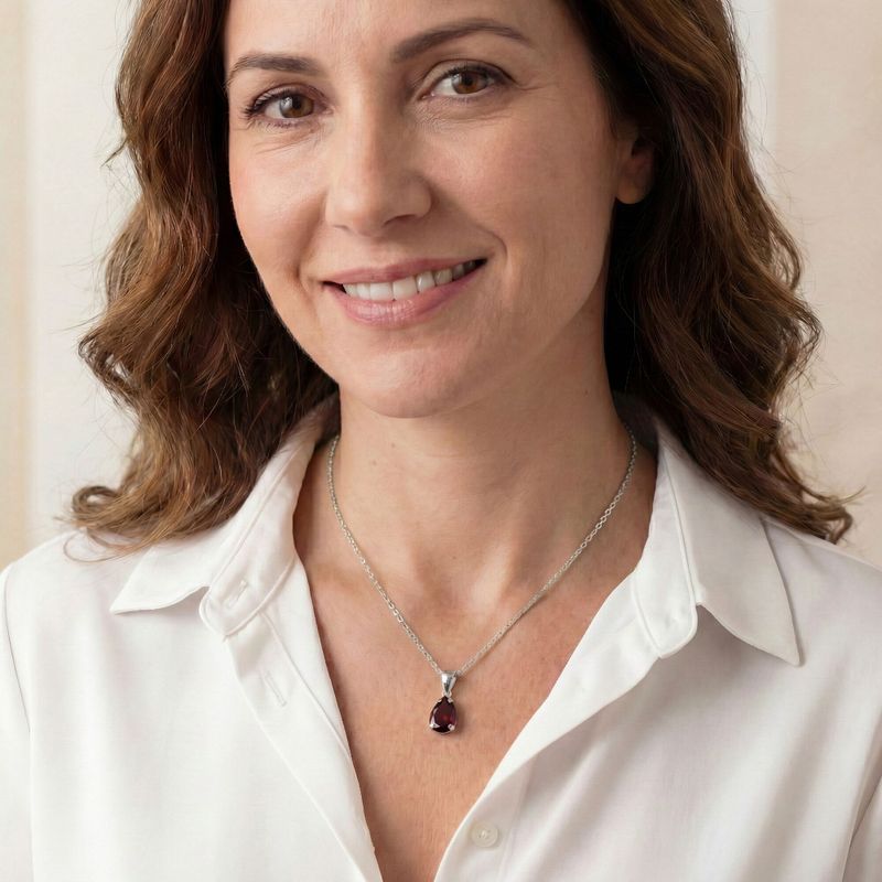 תליון טיפה זהב לבן 14 קראט גרנט