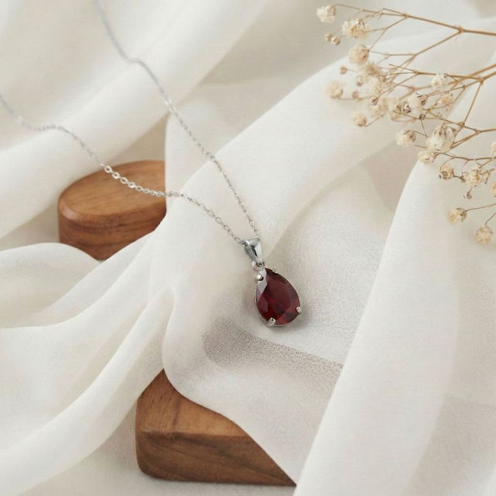 תליון טיפה זהב לבן 14 קראט גרנט