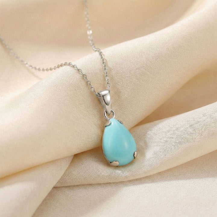 תליון טיפה זהב לבן 14 קראט טורקיז מלאכותי