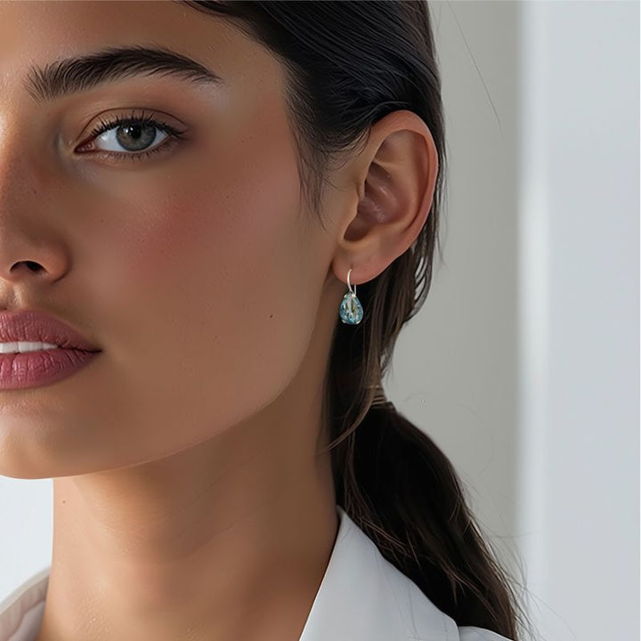 עגילי כסף תלויים – טופז תכלת