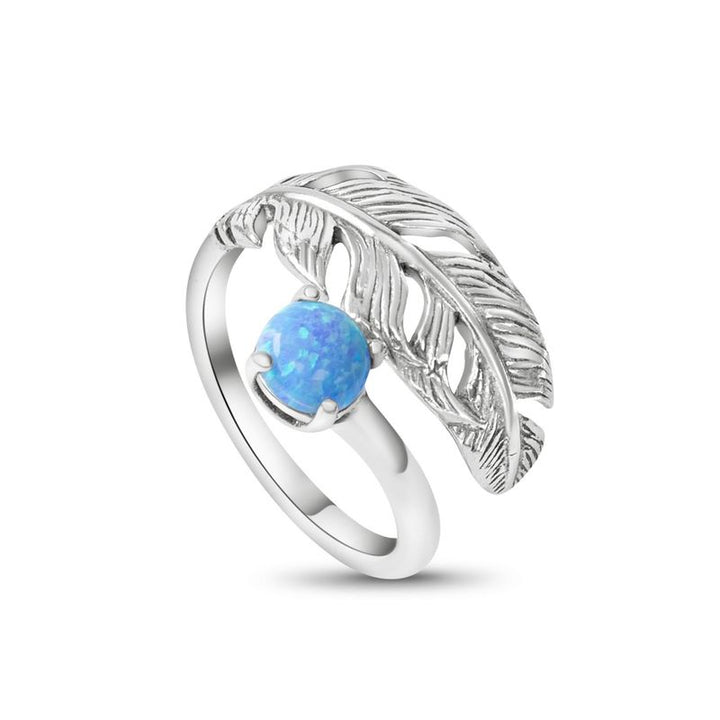 טבעת כסף 925 מתכוונת נוצה אבן אופל כחול