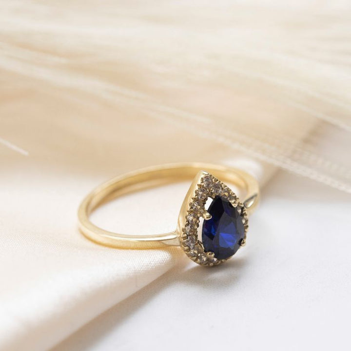 טבעת זהב 14K טיפה זירקון כחול